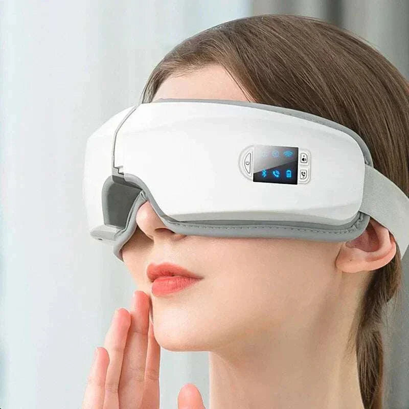 Masseur oculaire intelligent 4D avec massage vibrant et compresses chaudes pour soulager la fatigue des yeux.